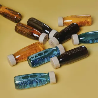 Petit Boum szenzoros játék - Float bottle - Cúrcuma